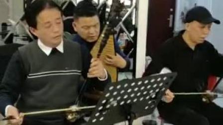 淮剧《十九年年年为儿缝新衣》